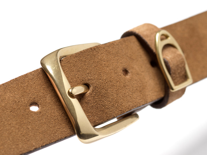 Close-up of the Chatsworth tan suede belt buckle