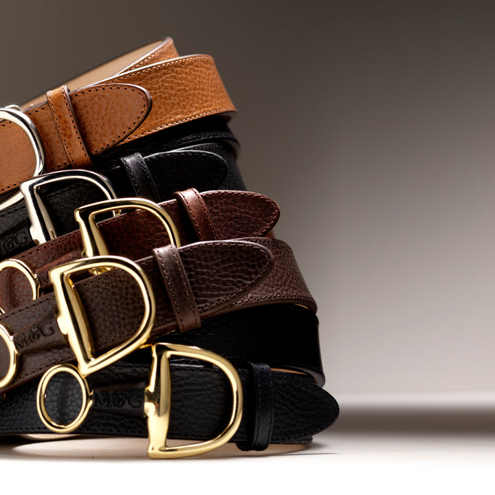 Stacked Windsor belts showing leather colours and buckle finishes