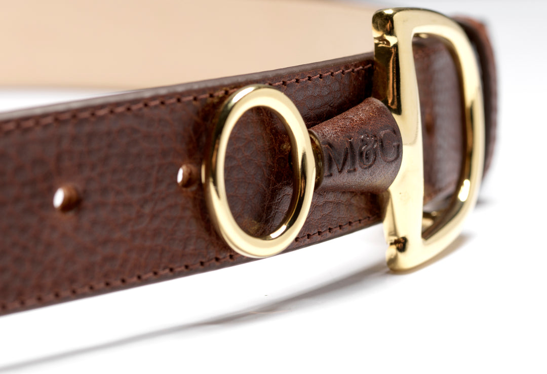 Close-up of a Windsor brown leather keeper and gold-tone ring