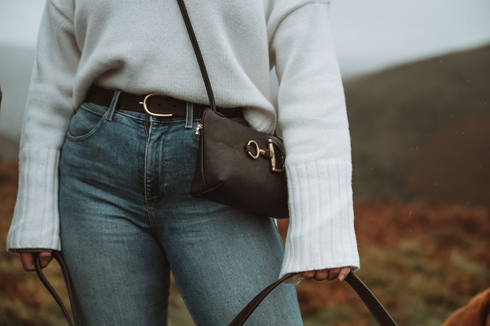 Eversley brown crossbody bag worn with jeans
