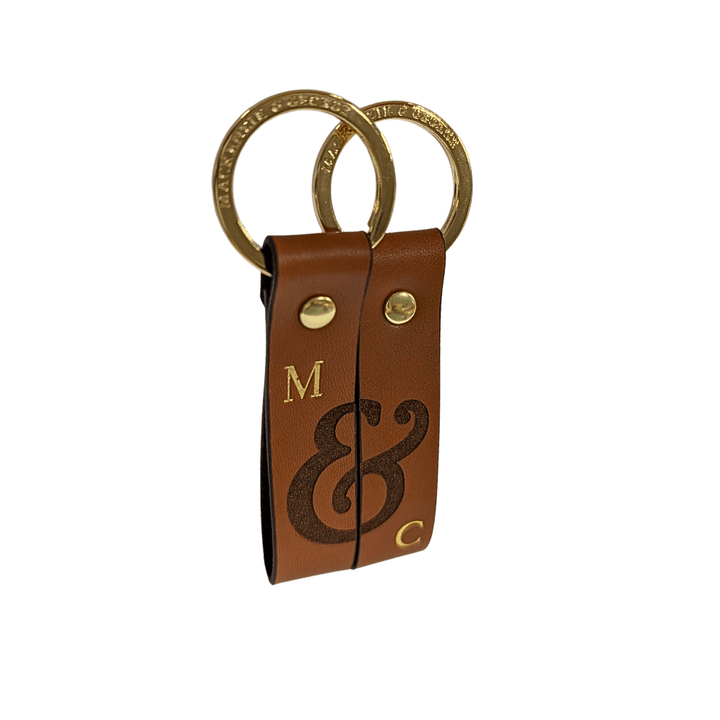 Tan couples leather keyrings with ampersand design and initials