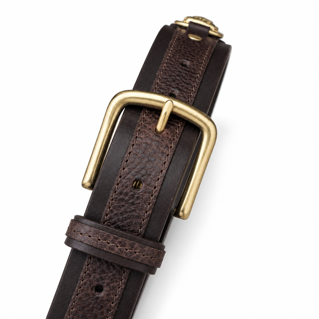 Close-up of the Beaufort dark brown leather belt buckle