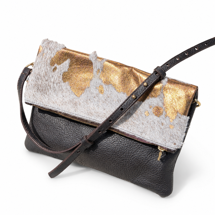 Stowfold bag with white-and-gold hide flap and crossbody strap