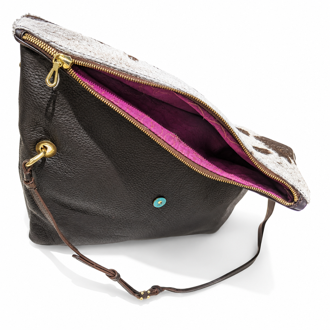 Open Stowfold bag showing the zip and purple interior