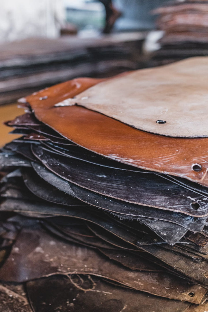 Stacked leather hides in a tannery