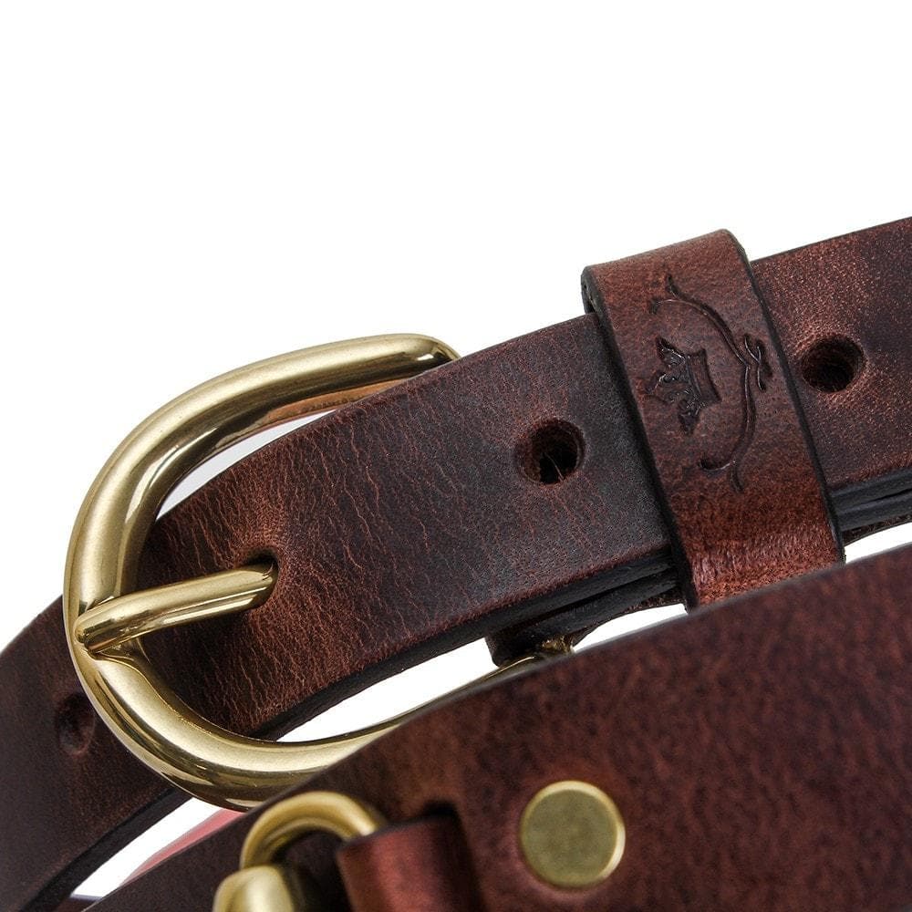 Close-up of the Badminton dark brown leather buckle and embossed keeper