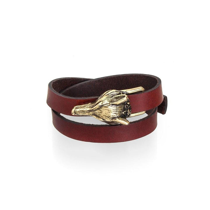 Cross Fox brown leather wrap bracelet with gold-tone fox head, close view