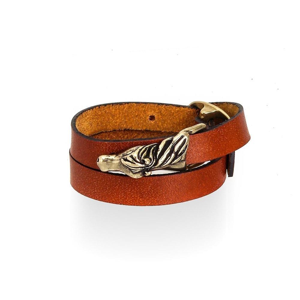 Crossed Horse tan leather wrap bracelet with gold-tone horse fitting