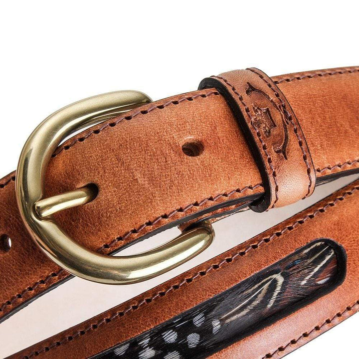 Close-up of the Drayton tan leather buckle and feather panel