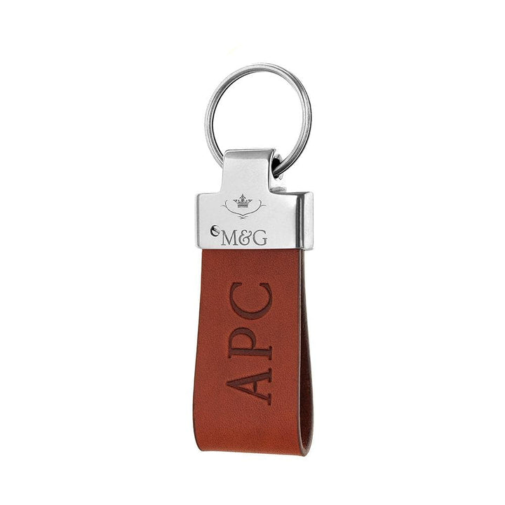 Tan M&amp;G leather keyring with silver-tone fittings and blind-embossed initials