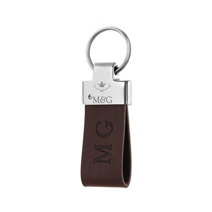 Brown M&amp;G leather keyring with silver-tone fittings and blind-embossed initials