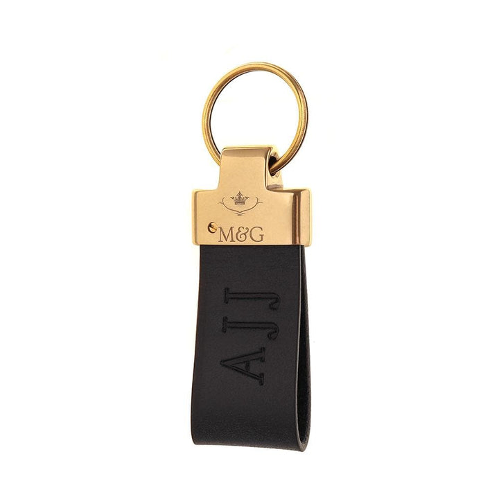 Black M&amp;G leather keyring with gold-tone fittings and blind-embossed initials
