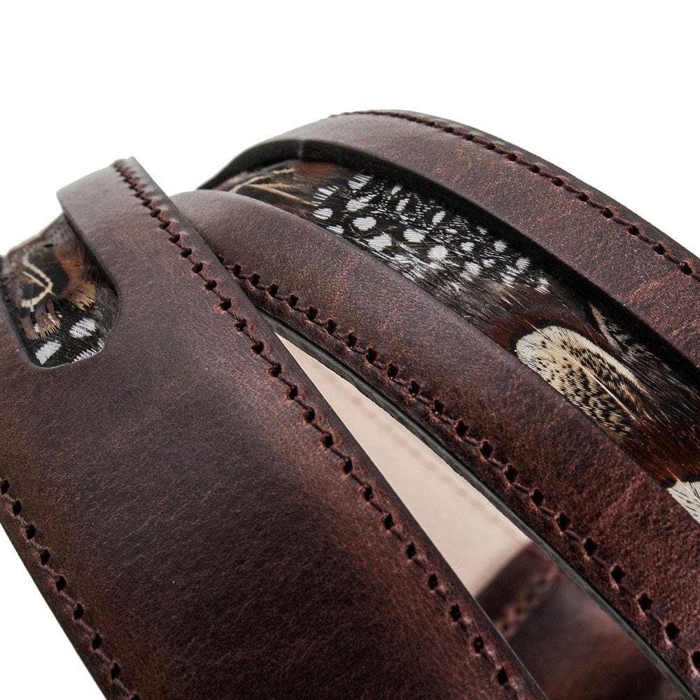 Close-up of the Warwick dark leather stitching and feather panel